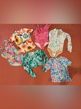 Lot of girls swimwear, floral, zebra, fruit patterns. Size 6-7. EUC!